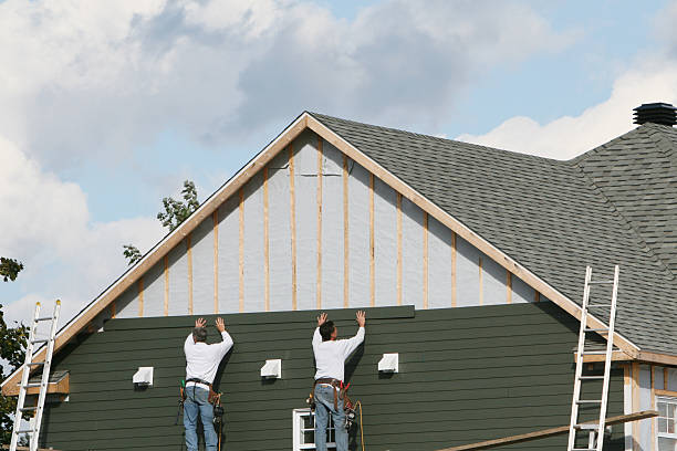 Professional Siding Contractor technician working in Caledonia, OH